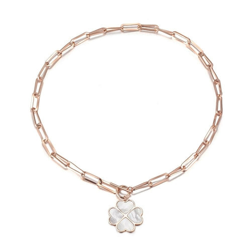Rose gold bracelet with a clover-shaped charm on a white background