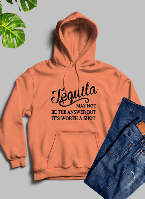 Orange hoodie with 'Tequila may not be the answer but it's worth a shot' text, paired with blue jeans on a gray background.
