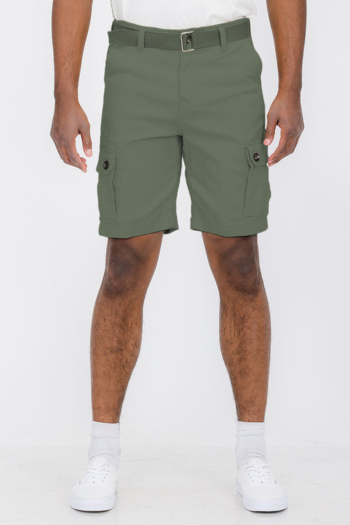 Person wearing green cargo shorts on a white background